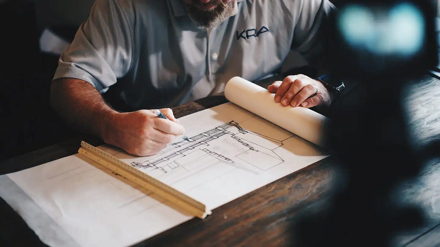 architect sketching villa design image